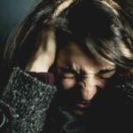 Anxiety disorder symptom: A girl with headache